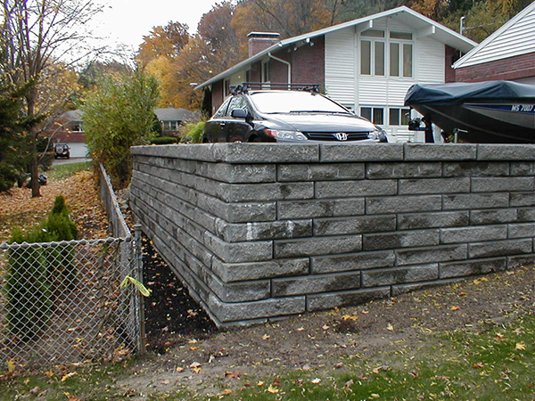 How to build a retaining wall next to a driveway